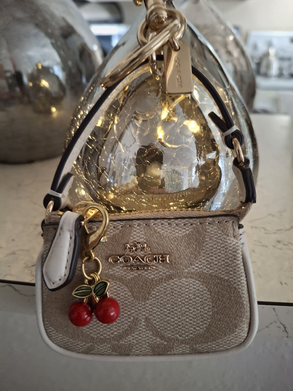 Coach Beige Signature Mini Bag with Red Cherry Charm